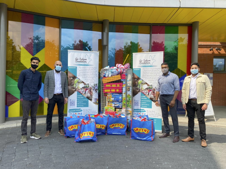 Workers with toys to hand out to less fortunate children.