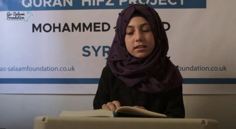 Girl praying the Quran after her Hifz sponsorship