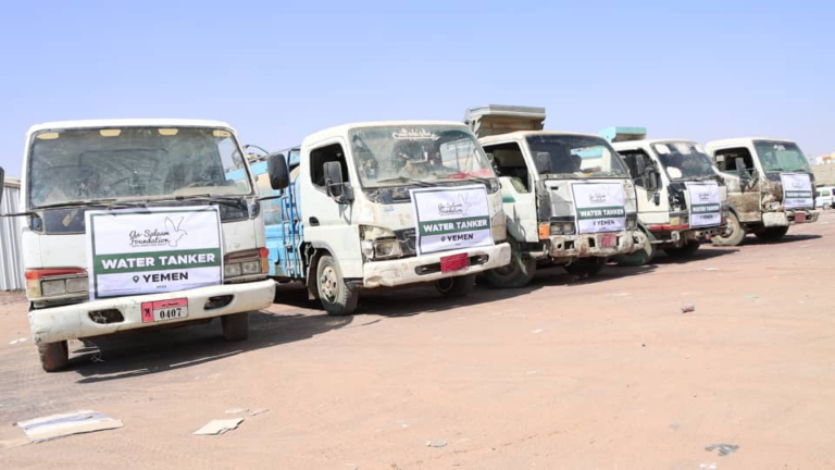 Water tankers in Yemen parked up as part of a water project.