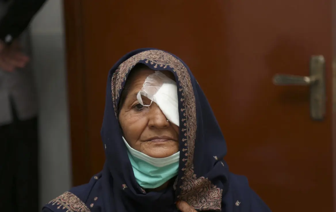 Elderly woman with a bandage over one of her eyes after a successful cataract operation