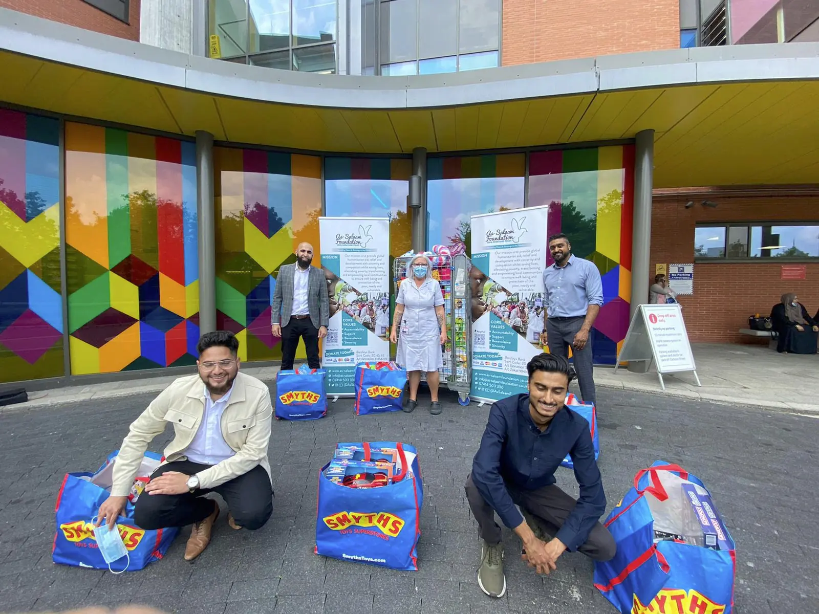 Volunteers working a charity project based in the UK for As-Salaam Humanitarian Foundation